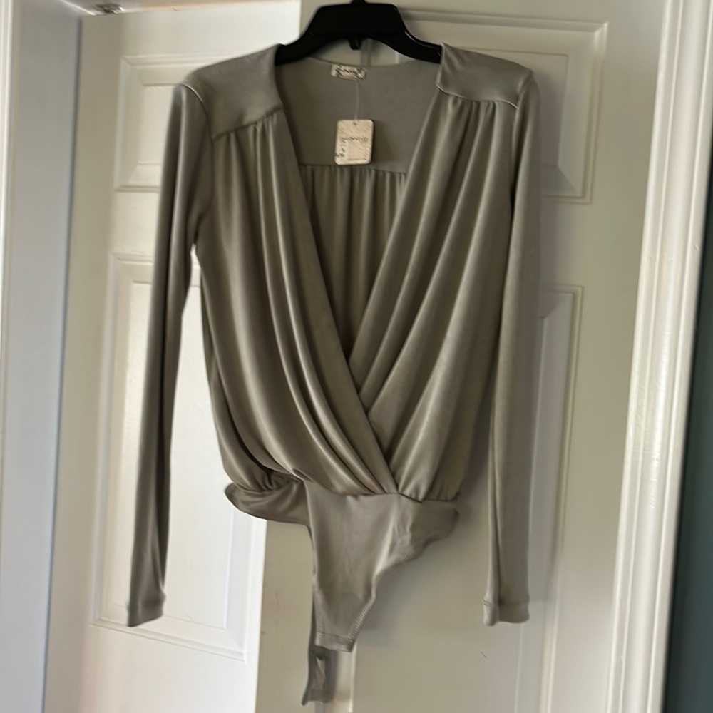 Intimately Free People Bodysuit. Tag still on and never worn